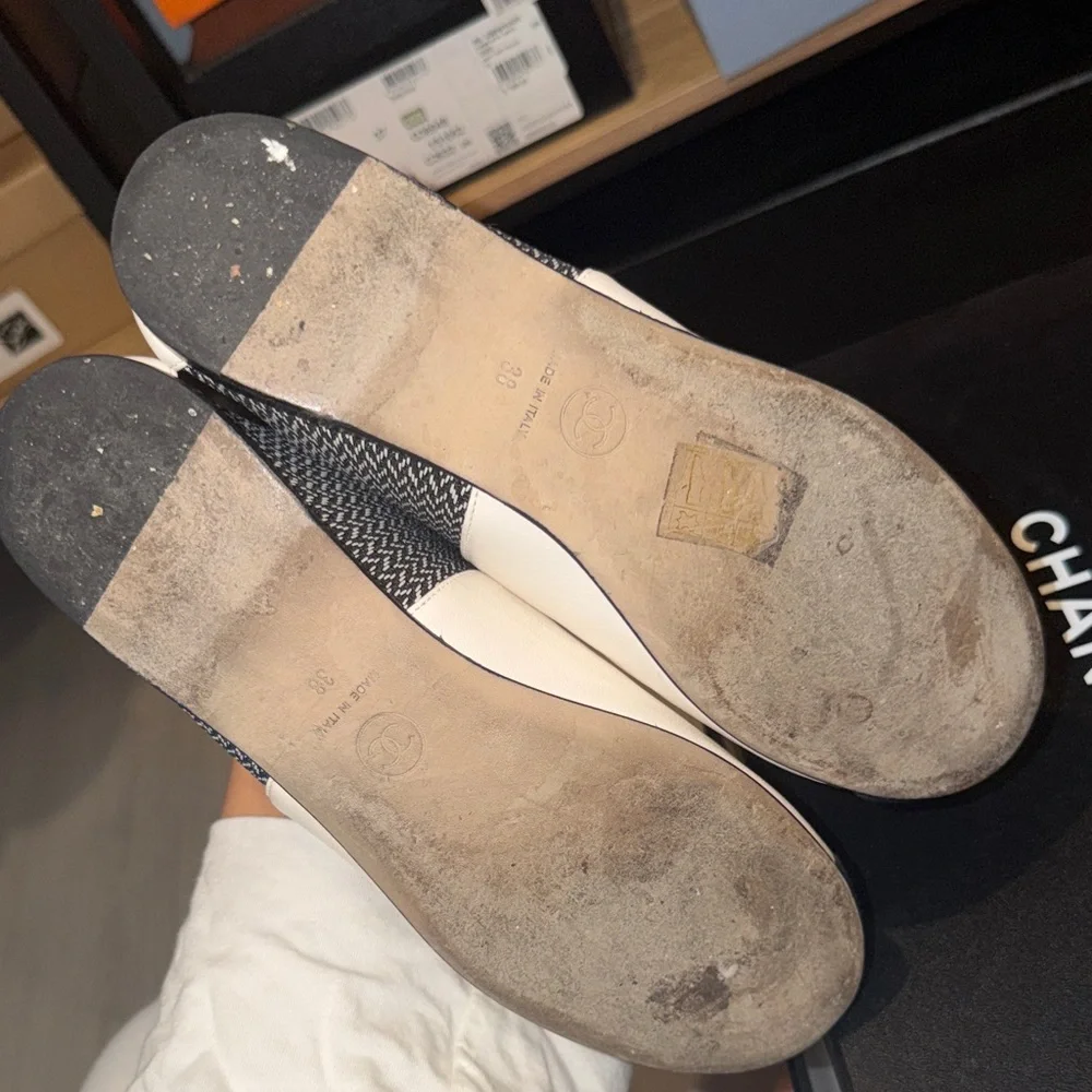 CHANEL Cream and Black Leather Camellia Slip-On Moccasins